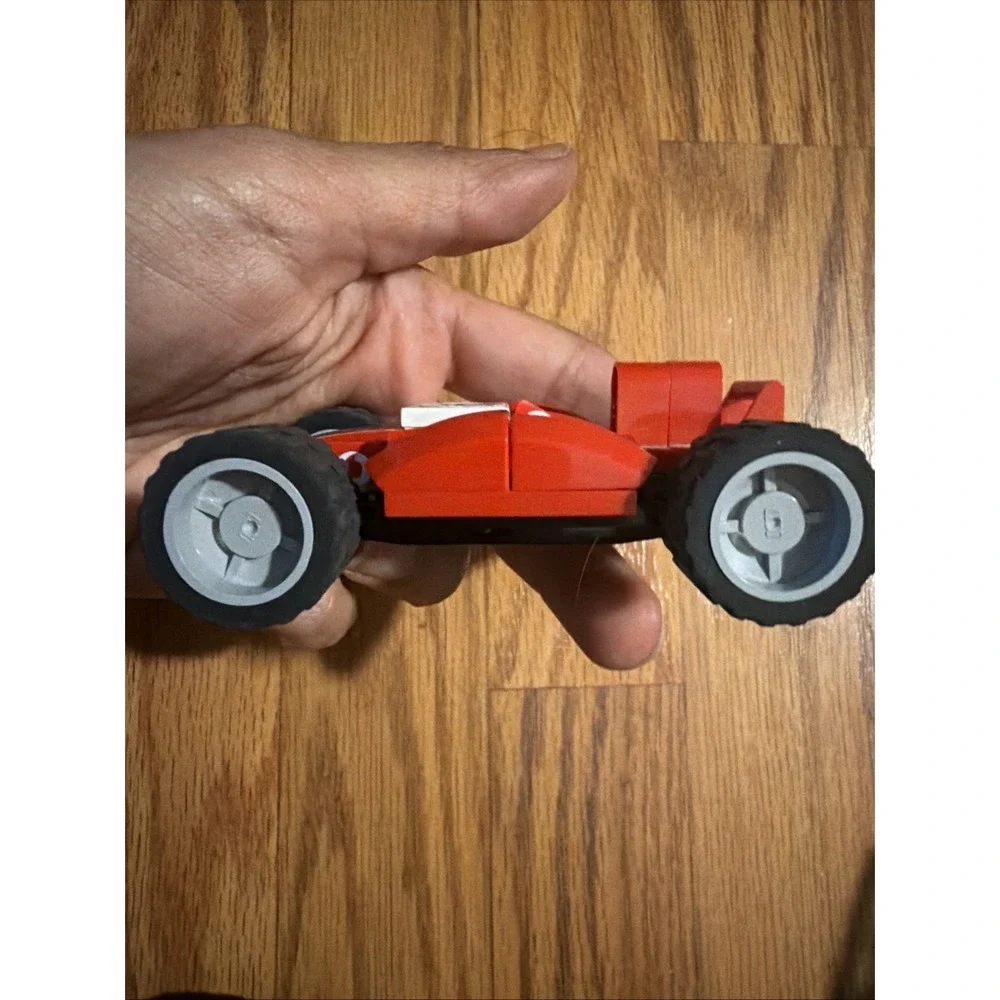 Red Lego Ferrari Bridgestone Shell Four-Wheel Car